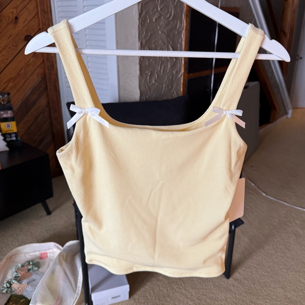 Elegant Yellow Tank Top With White Bow Detailing